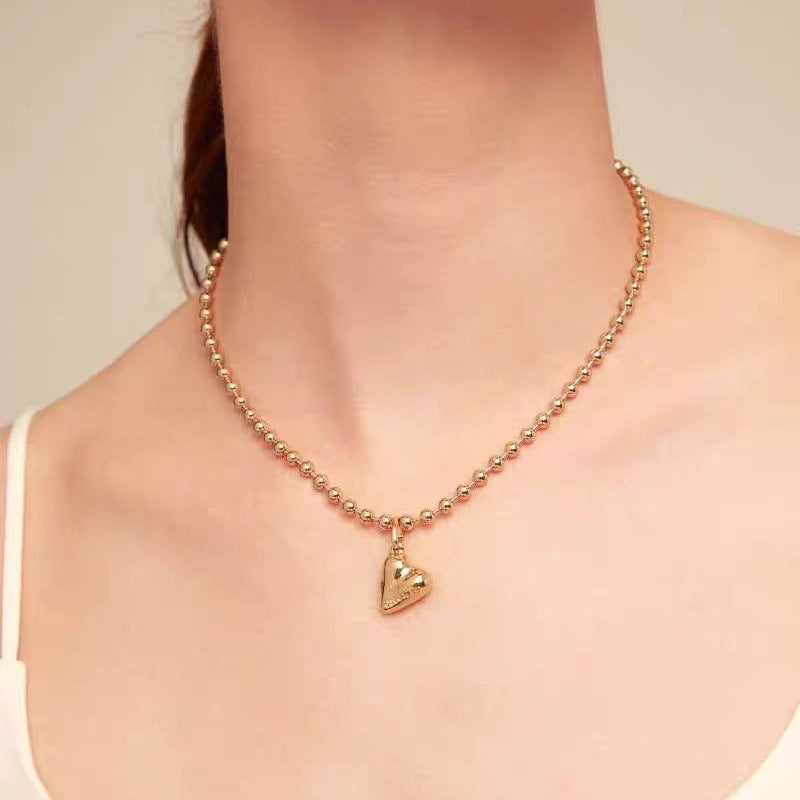 UNOde50 Bead necklace with heart detail