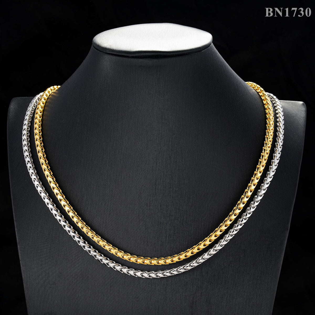 Gold and silver 4mm franco chain necklaces layered on black neck mannequin display
