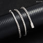 Gold, silver, and rose gold 4mm franco chain necklaces aligned on jewelry display tray