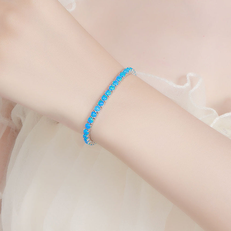 Female model wearing the bracelet on wrist.