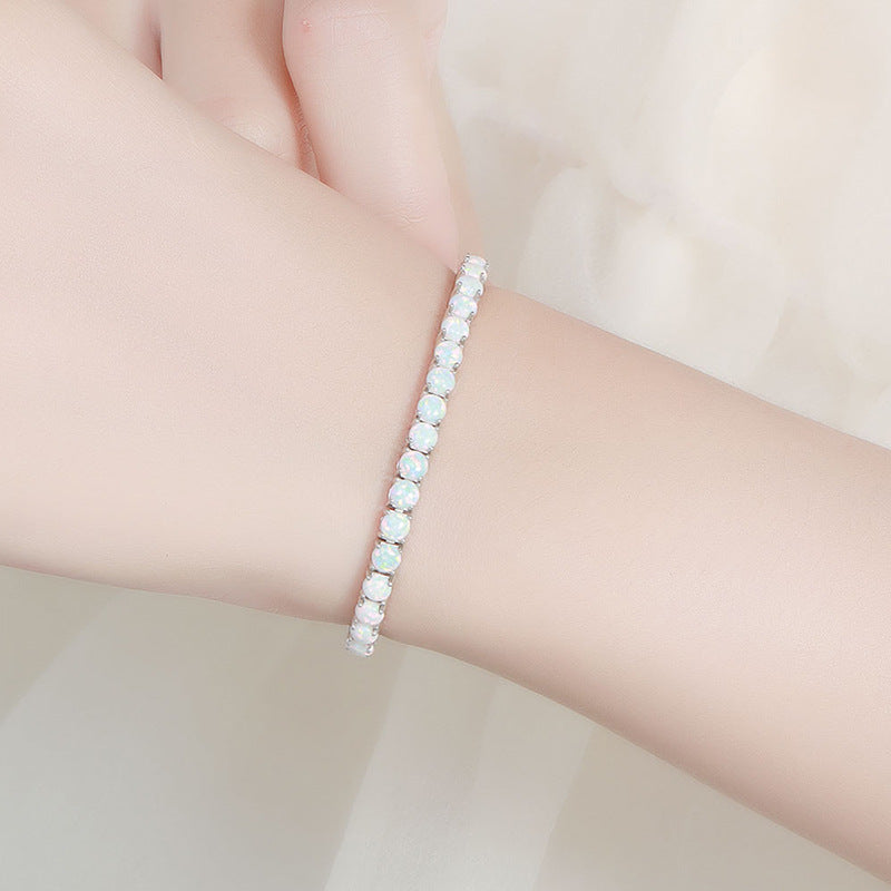 Female model wearing the bracelet on wrist.