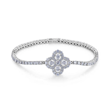 5.52 CTW diamond quatrefoil flower tennis bracelet in sterling silver.