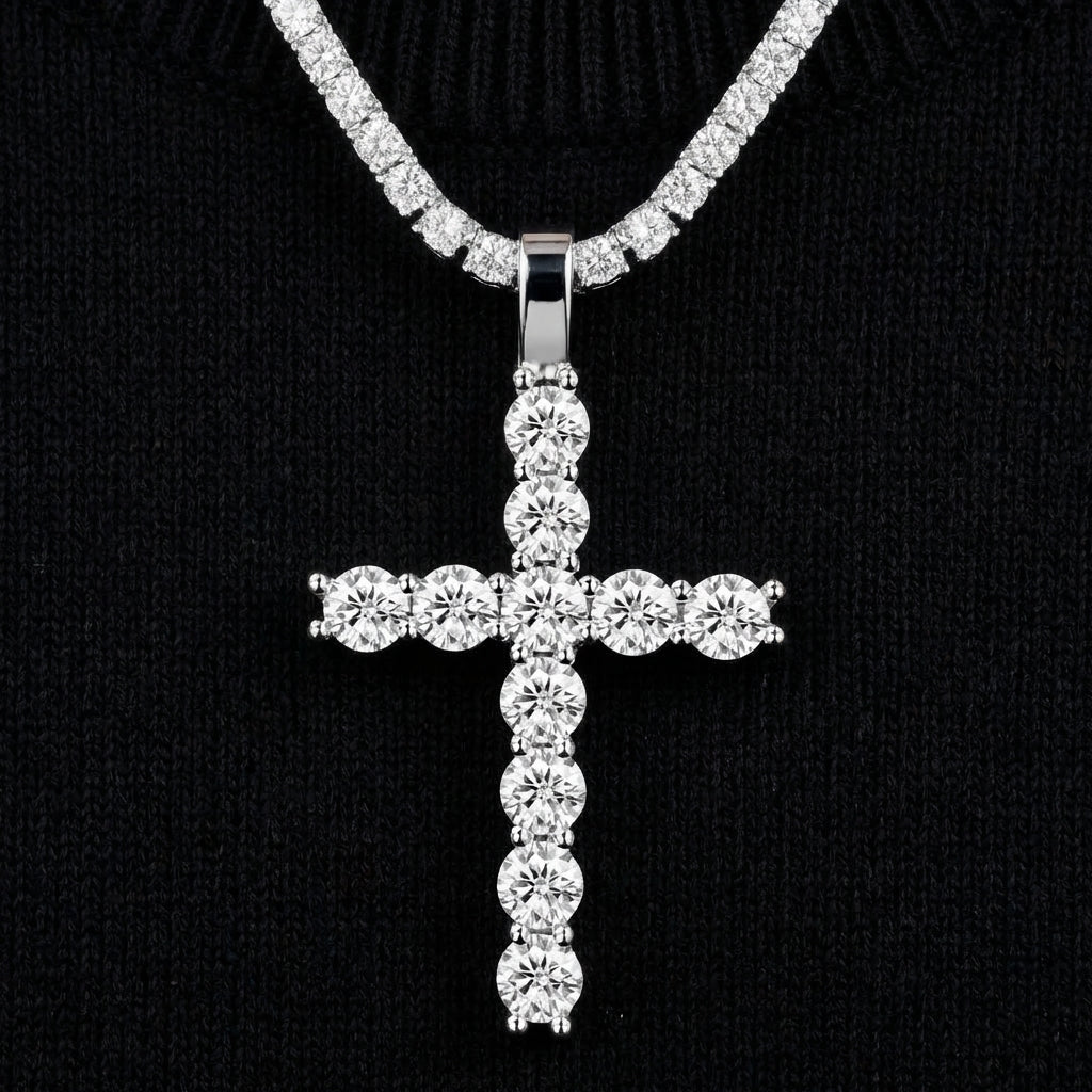 Clean black or dark background (to maximize sparkle contrast) — the 5MM moissanite hip hop cross pendant displayed on a bust form or flat surface. The fully iced cross catches bright light, showcasing exceptional fire and brilliance from every angle.