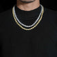Model wearing silver and gold 7.5mm moissanite iced out rope chain necklaces.