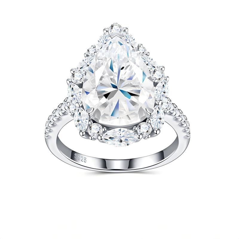8CT pear cut moissanite engagement ring with starburst marquise cluster halo and pave shank on white background.