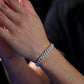 Model wearing the bracelet solo in a casual, everyday setting.


