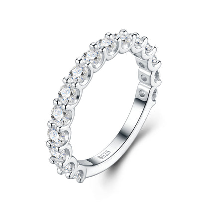 Studio display of 925 sterling silver moissanite bubble half eternity wedding band with clear interior S925 hallmark.