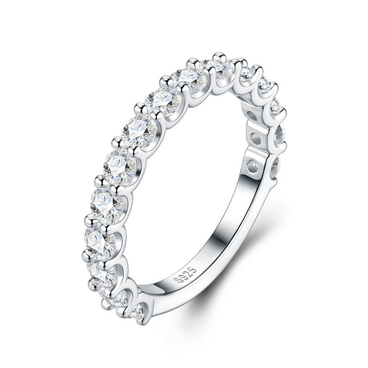 Studio display of 925 sterling silver moissanite bubble half eternity wedding band with clear interior S925 hallmark.