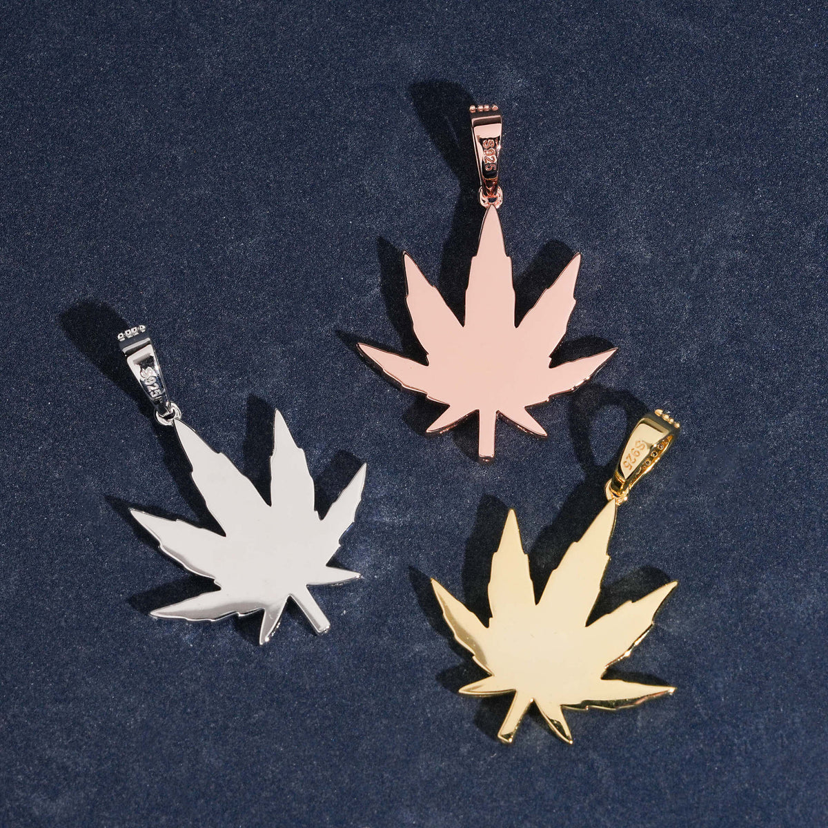 Smooth polished back view of 925 sterling silver moissanite weed leaf pendants in silver gold rose gold