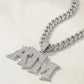 Studio micro close-up displaying 925 sterling silver iced out ATM letter pendant with full micro pave moissanite stones.