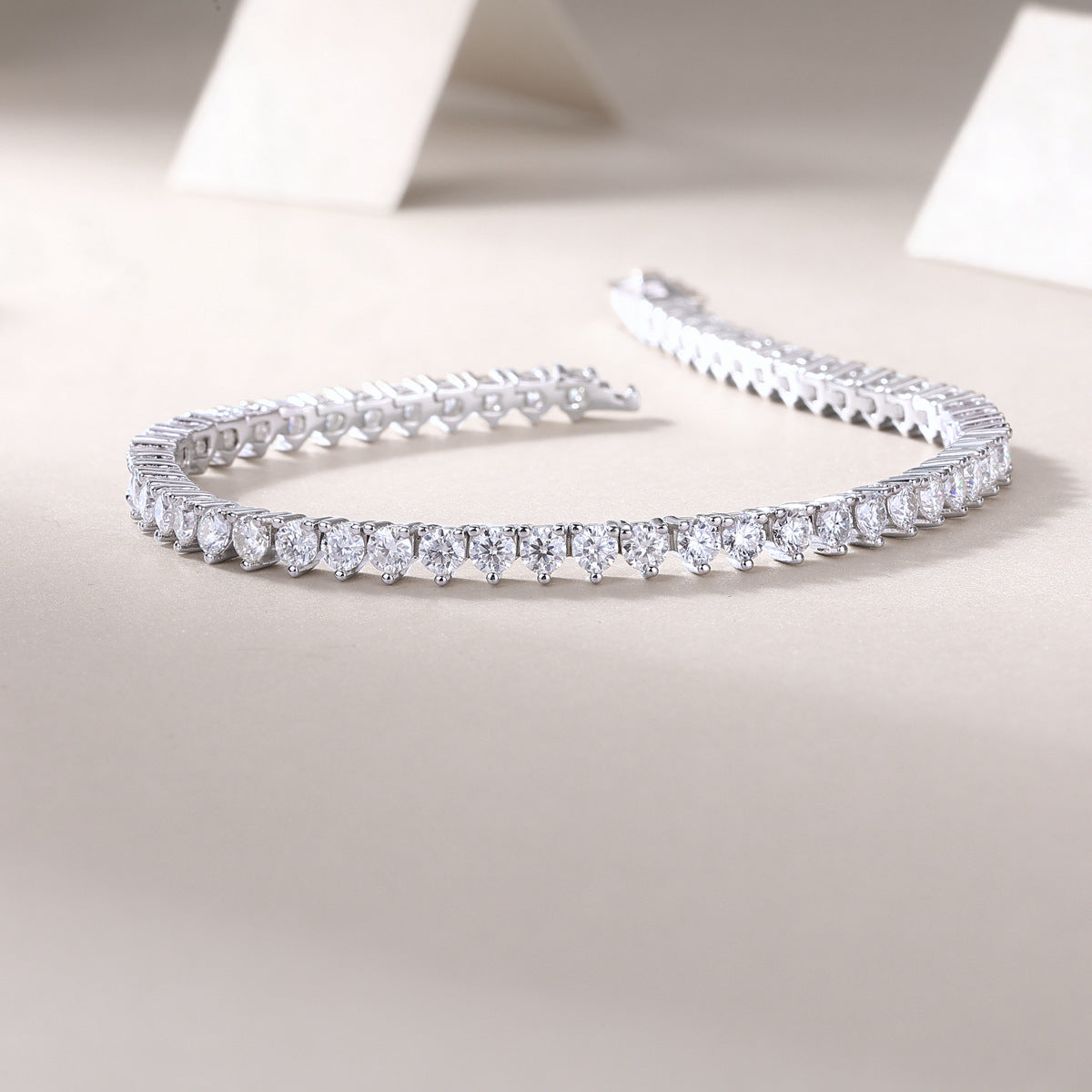  “Stackable Gold Luxury: Moissanite Tennis Bracelet.”