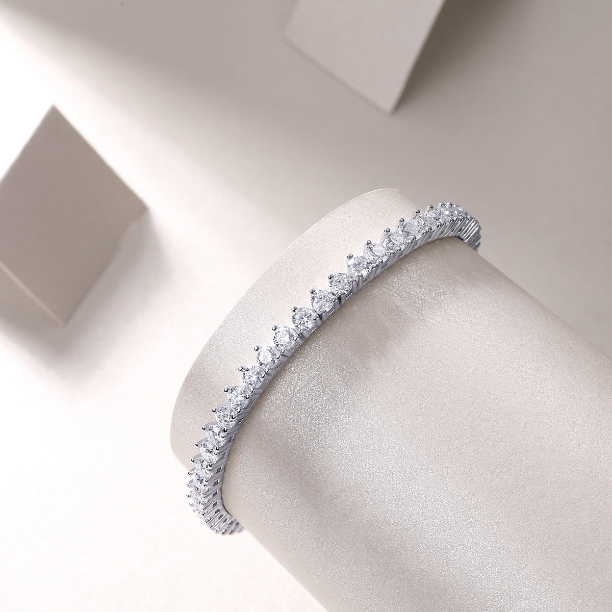 Sterling silver and 18K gold-plated Moissanite tennis bracelet with sparkling stones, elegant jewelry by ZERRA.