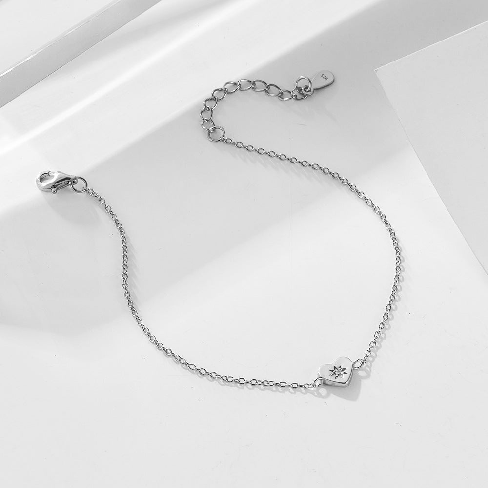 Close-up of Heart Charm and Gold Plating Texture