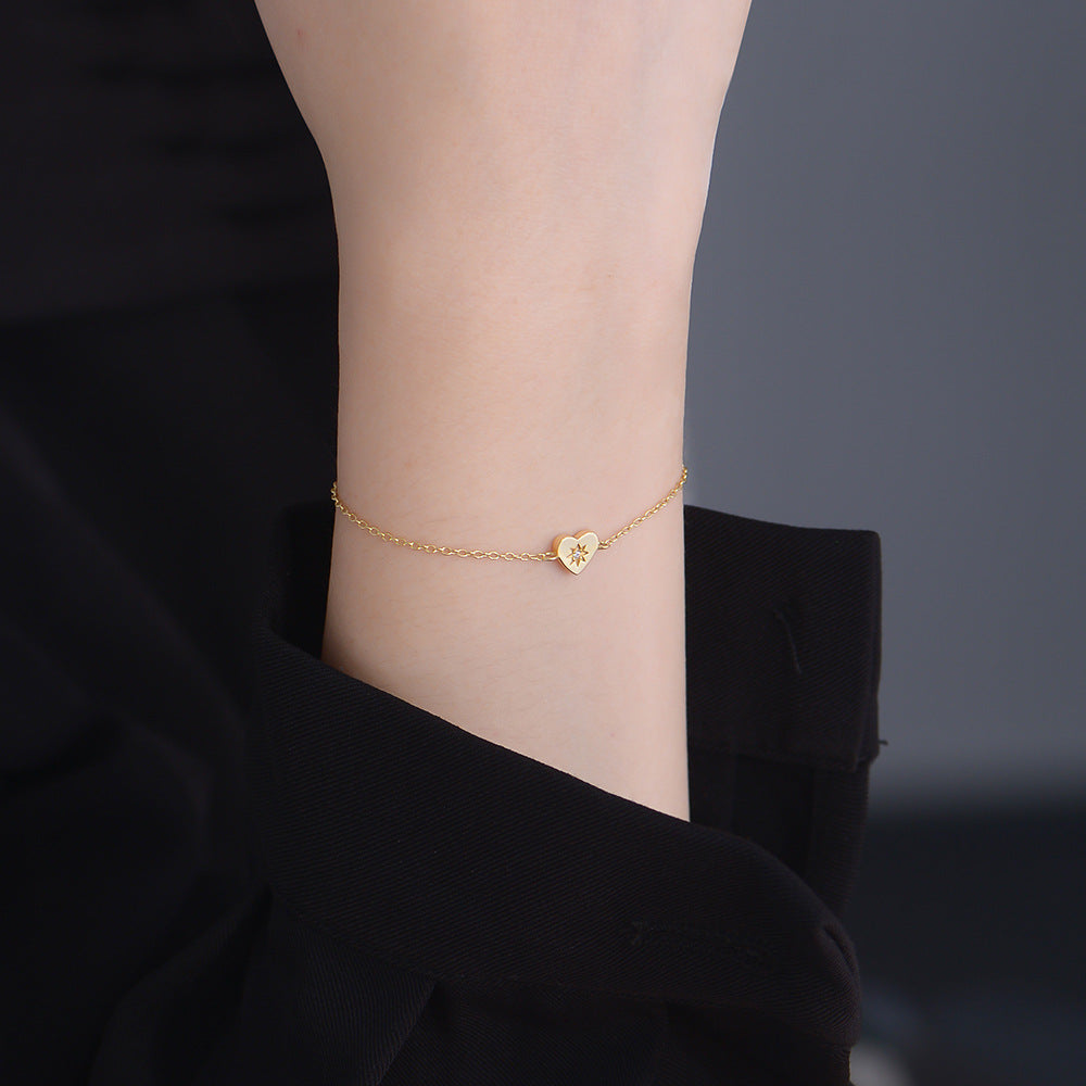 Woman Wearing Minimalist 14K Gold Heart Bracelet INS Style