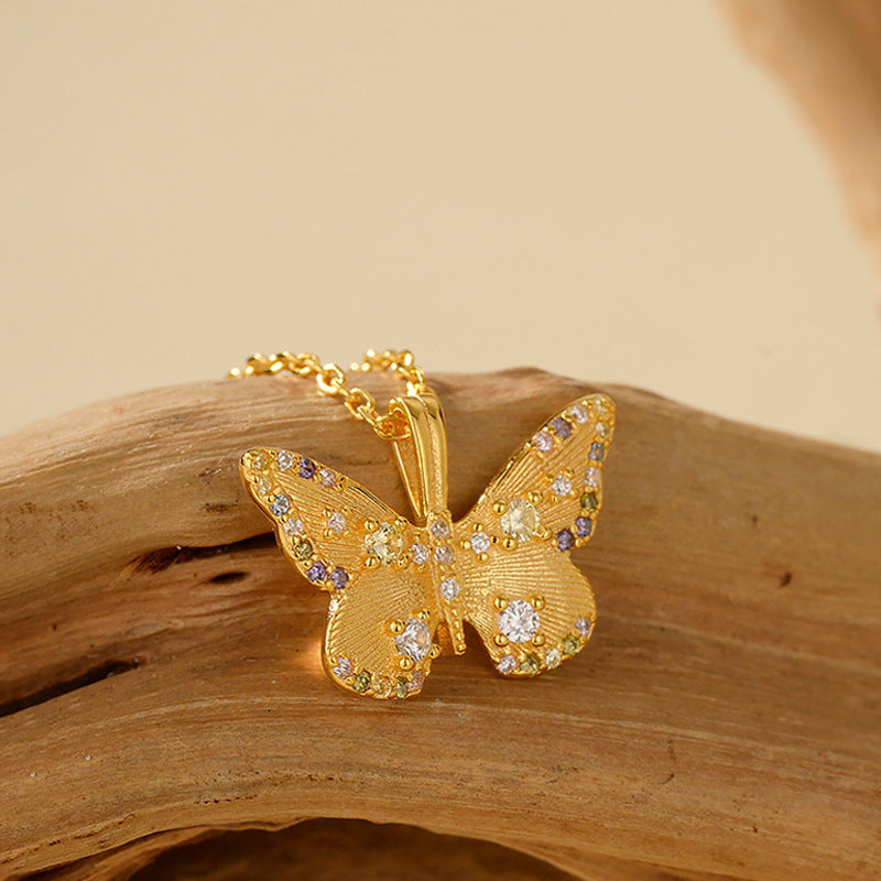 Close-up of Brushed Silver Butterfly Pendant with Colorful Cubic Zirconia