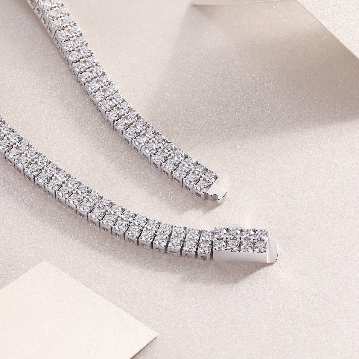  Macro of secure lobster clasp with safety latch. Alt: “Safety Clasp Detail – Double-Row Bracelet.”