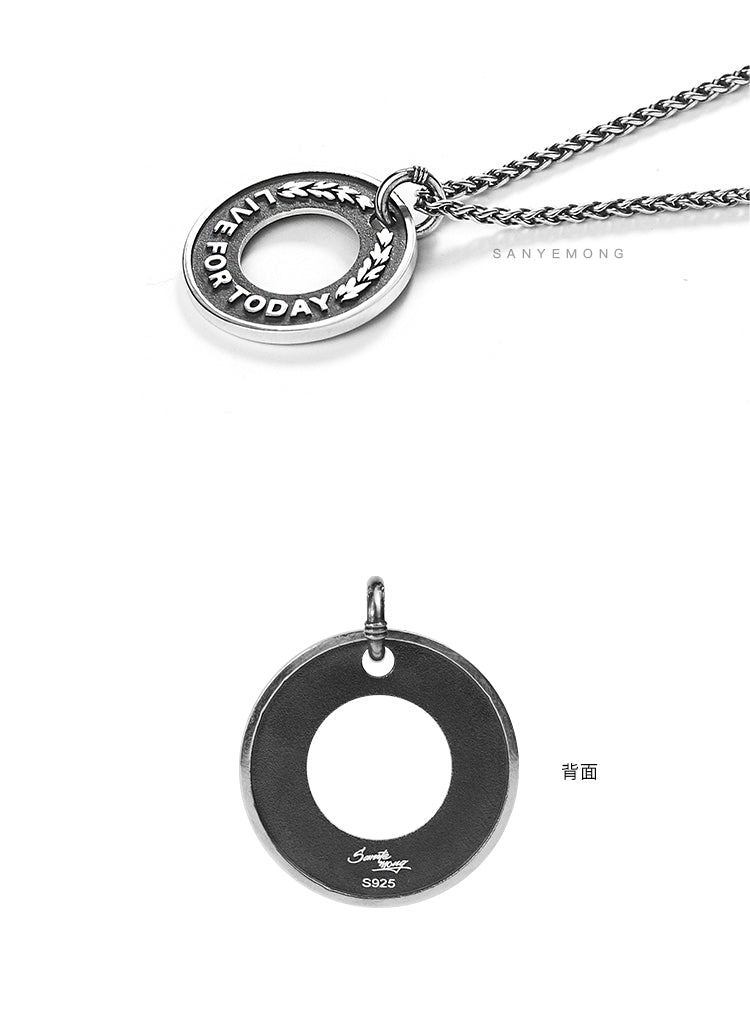 “Close-up of hollow-carved dragon bone round pendant in 925 silver”