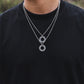 “Male model wearing dragon bone round medallion necklace streetwear style”