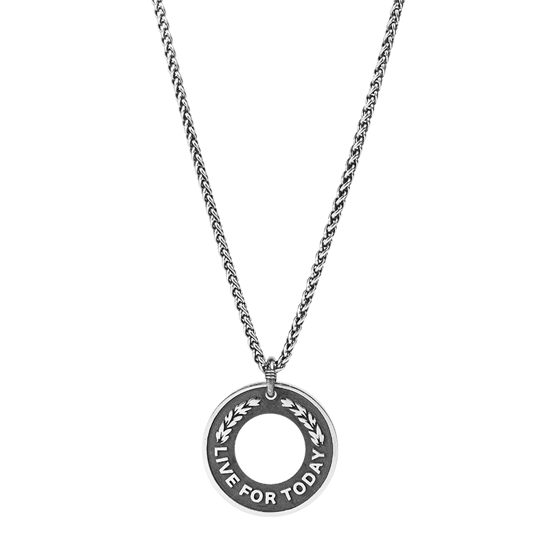 “Sterling silver dragon bone medallion necklace flat lay photo”