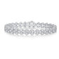 Yellow gold heart moissanite bracelet on neutral background. Alt: “Heart Moissanite Tennis Bracelet – 18K Yellow Gold.”