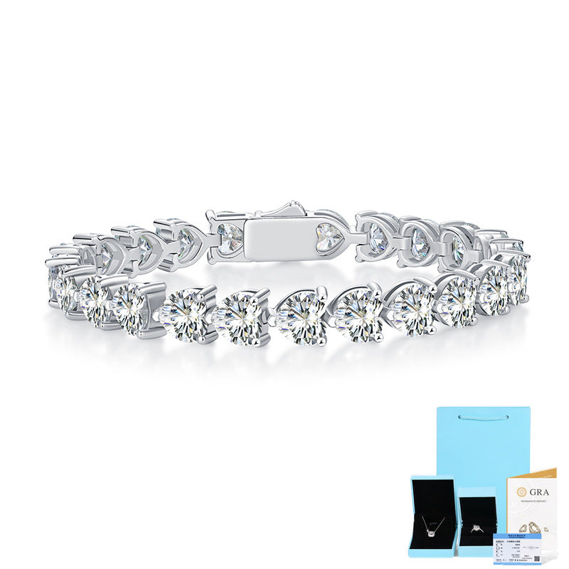 Bracelet styled with romantic or Valentine's accents. Alt: “Wear Your Heart: Styling Heart Cut Moissanite Bracelet.”