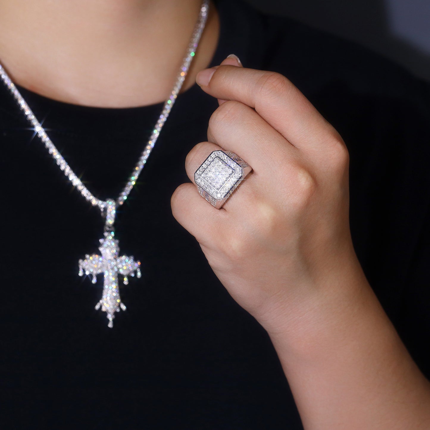Model with streetwear aesthetic (watch, chain, clean sneakers) wearing the ring.