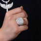 Model with authentic streetwear style (chain, watch, clean sneakers) wearing the ring.