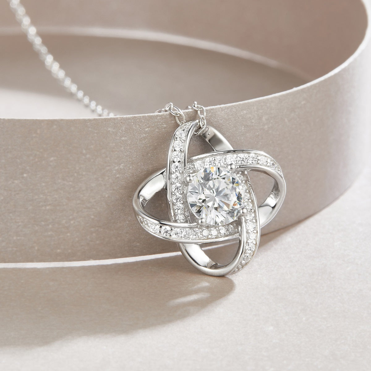 High-definition shot of the necklace laid flat on pure white background.