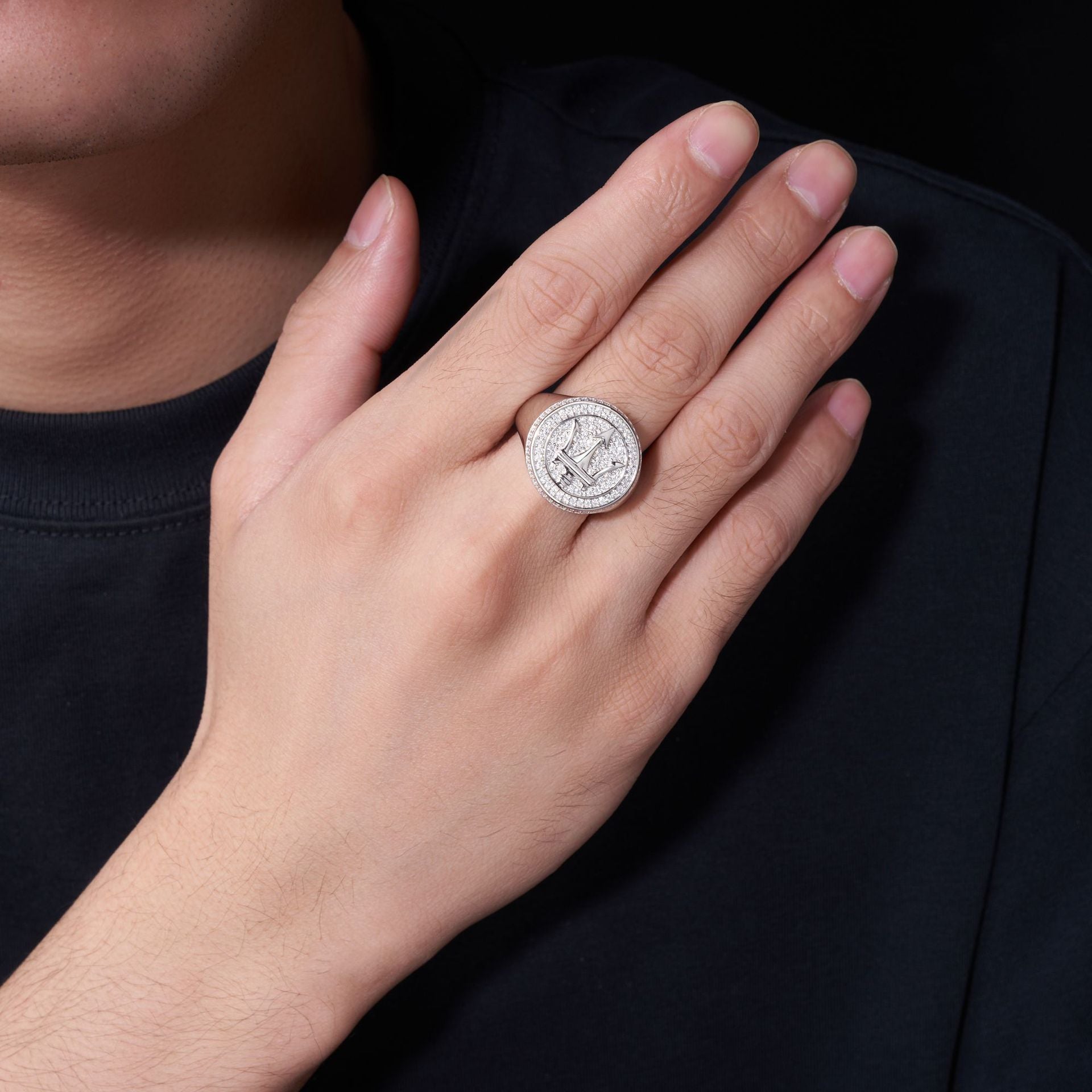 Male model wearing the ring on finger.