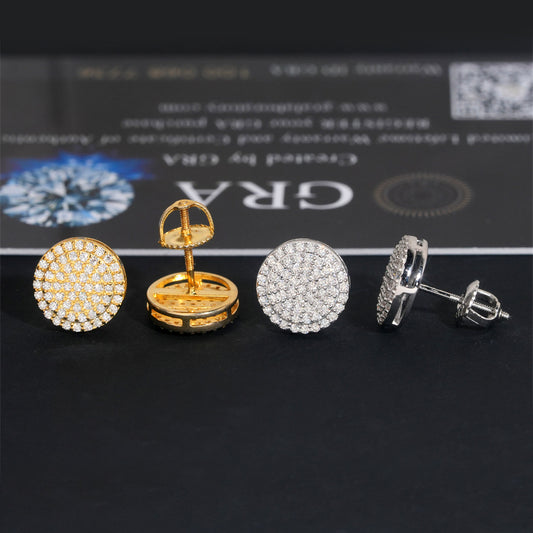 Gold moissanite studs on neutral background. Alt: “18K Gold Moissanite Round Earrings – 925 Silver Unisex.”