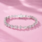 Elegant flat lay featuring 4–5 multi-shape bracelets on neutral backdrop with varied cut illustrations. Alt: “925 Sterling Silver Multi-Shape Moissanite Tennis Bracelets Collection.”