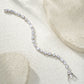 Elegant flat lay featuring 4–5 multi-shape bracelets on neutral backdrop with varied cut illustrations. Alt: “925 Sterling Silver Multi-Shape Moissanite Tennis Bracelets Collection.”