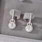 Yellow gold 20mm pavé drop earrings on neutral background. Alt: “20mm Pavé Drop Moissanite Earrings – 18K Yellow Gold.”