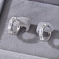 Yellow gold 1.5ct emerald moissanite studs on neutral background. Alt: “1.5ct Emerald Cut Moissanite Earrings – 18K Yellow Gold.”