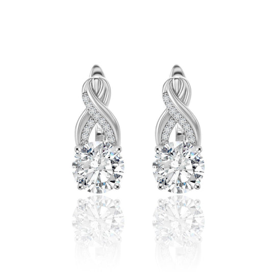  Yellow gold 10mm infinity moissanite studs on neutral background. Alt: “10mm Pavé Infinity Moissanite Earrings – 18K Yellow Gold.”