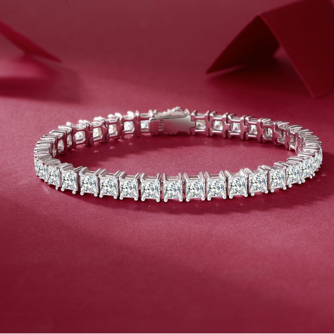 Sterling silver square moissanite tennis bracelet by ZERRA, featuring sparkling square moissanite stones on a sleek silver chain.