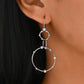 Earrings worn as celestial statement. Alt: “Celestial Sparkle: Star Moissanite Earrings.”

