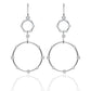 Yellow gold 20mm star drop earrings on neutral background. Alt: “20mm Star Moissanite Drop Earrings – 18K Yellow Gold.”

