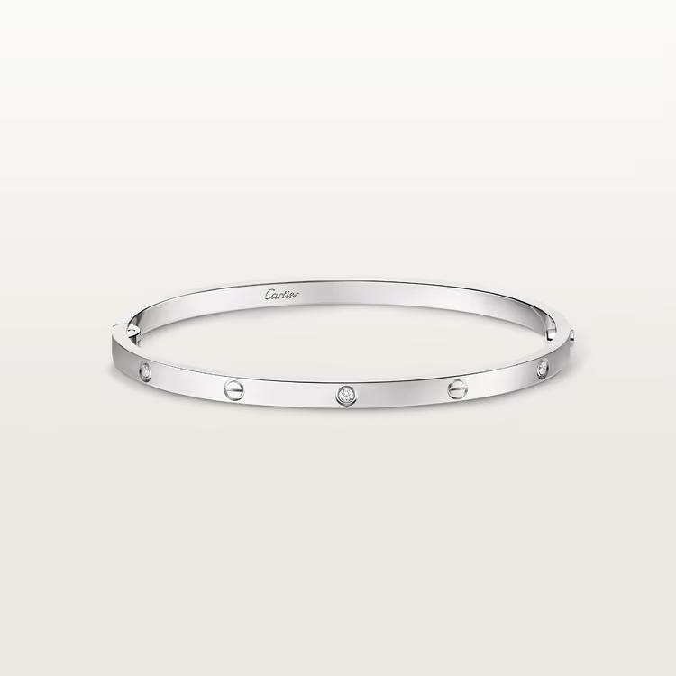 Zerra Jewelry Cartier LOVE bracelet in small size with 6 diamonds, showcasing a sleek gold design and elegant clasp.