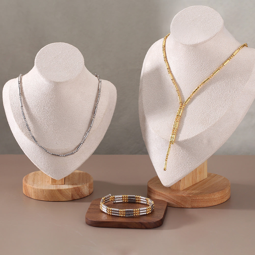 High-definition shot of the necklace laid flat or coiled on pure white.