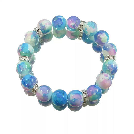 Multicolored beaded bracelet with silver accents on a white background