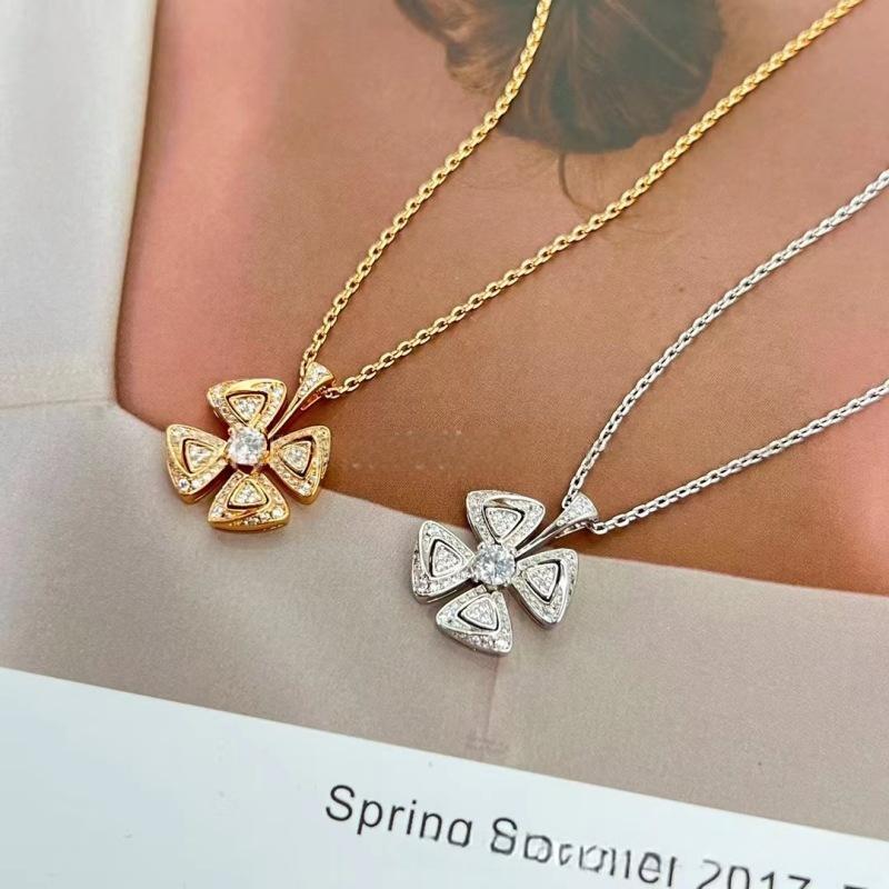 BVLGARI Fiorever Necklace Fiorever 18 k rose gold necklace one gold and one silver, on a person's neck.