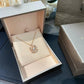 BVLGARI Fiorever Necklace Fiorever 18 k rose gold necklacewith a pendant in an open jewelry box on a dark surface