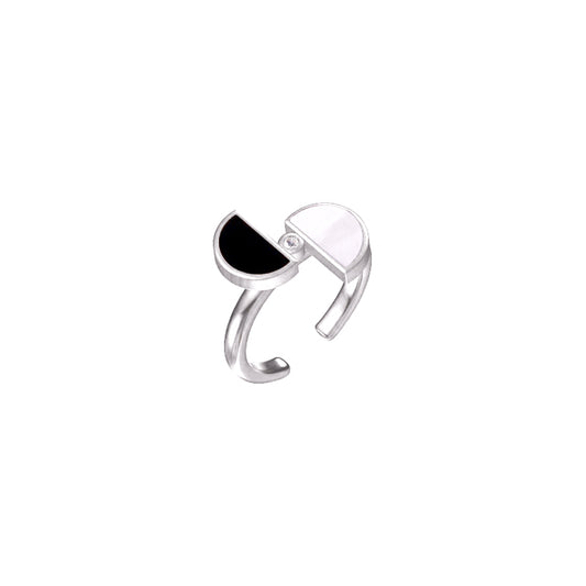 Silver ring with a black gemstone on a white background