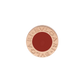 Bulgari ring with red stone on a white background