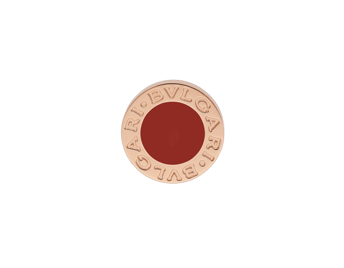 Bulgari ring with red stone on a white background