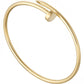 Gold bangle on a white background