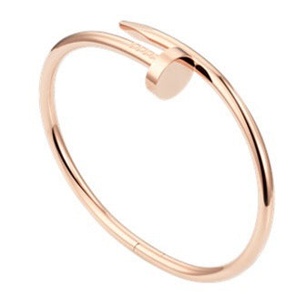 Rose gold bracelet on a white background