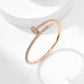 Rose gold bracelet on a white background