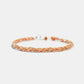 Bracelet with orange beads on a white background